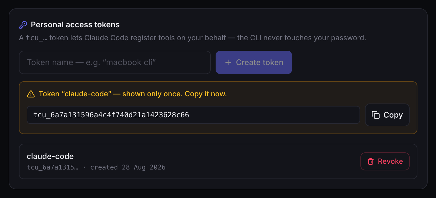 The Personal access tokens card in Settings, with a freshly created token named claude-code revealed once for copying